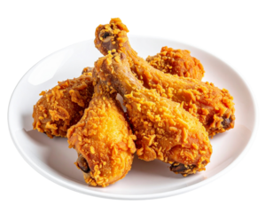 Breaded and fried chicken legs, on a white plate with isolated on a transparent background