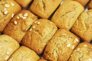 Freshly baked bread rolls Banana Cake, perfect for breakfast or bakery product marketing, delicious golden crust and soft texture. pieces to accompany food.