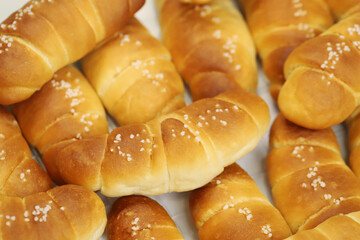 Freshly baked bread rolls Shio Pan, perfect for breakfast or bakery product marketing, delicious golden crust and soft texture. pieces to accompany food.
