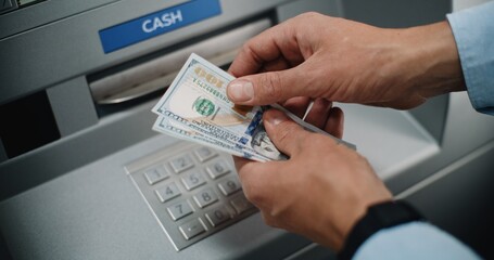 Unrecognizable Man, Businessman Counting US Dollar Bills in Hands After Withdrawing Cash Money...