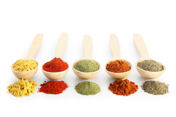 Different aromatic spices in spoons isolated on white