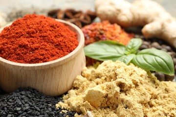 Many different spices on table, closeup view