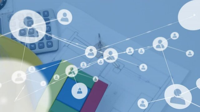 Translucent network connecting user icons with glowing lines over engineering tools on blue desk