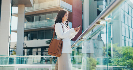 Business woman, city and realtor with phone for corporate building, investment or communication....