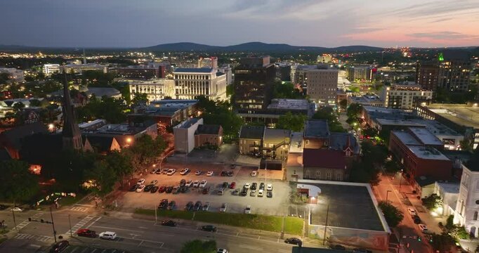 Old historic city architecture in Southern USA. View from above of illuminated streets of Huntsville, Alabama at night.