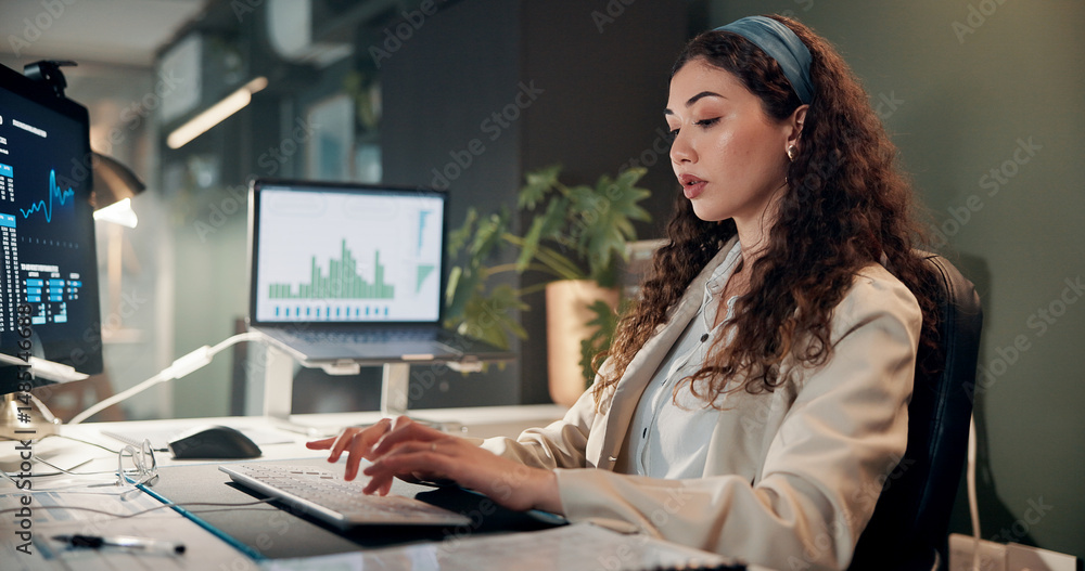 Poster woman, typing and computer with trading, graphs and review for revenue report in office at company. 