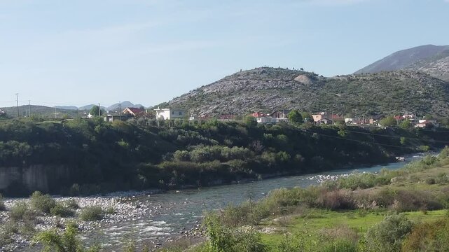 promenade around the Kiri river and Mesi bridge in Albania