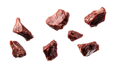 Obraz premium Raw beef steaks flying in the air isolated on a white background