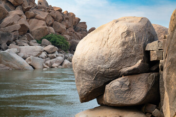 Boulder landscape of Hampi, Tungabhadra river, rocky terrain, South India, Karnataka, cyclopean granite boulders