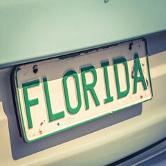 Florida license plate on vintage car with soft lighting