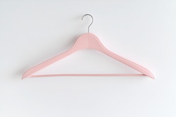 Elegant Pastel Pink Attire Displayed on Hanger Against a Clean White Backdrop for Spring Wardrobe Refresh
