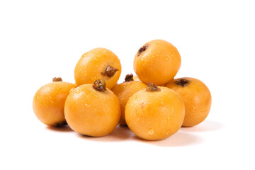 Ripe loquats fruit isolated on white background.