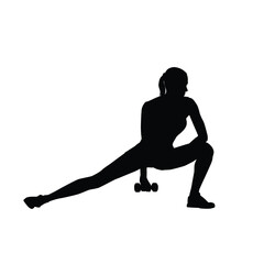 Silhouette of a woman exercising with a dumbbell