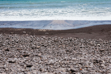 Scenic Fuerteventura beach with volcanic rocks and clear blue waters