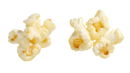 Close up of fluffy popped popcorn kernels isolated on a black background for snack lovers to enjoy on transparent background