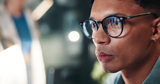 Business, glasses and man in office, reflection and online reading for stock market report. Person, employee and investor in workplace, eyewear and research for trading and review for profit growth