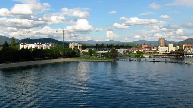 Aerial: Panning Scenic Shot Of The Coeur D'Alene Resort In Town, Drone Flying Over Lake - Coeur d`Alene, Idaho