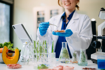 Scientist analyzing food samples in modern lab with advanced equipment for safety, nutrition, and...