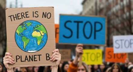 Protesters holding signs including "There is no Planet B" during climate rally. Powerful image symbolizing climate activism, social awareness, and urgent environmental demands. Ideal for campaigns
