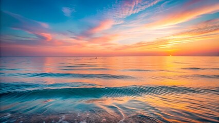 Fototapeta premium Serene Ocean Sunset with Colorful Sky and Gentle Waves