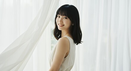 Naklejka premium Woman Smiling by Curtains
