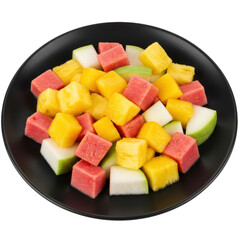 Colorful fruit salad with watermelon, pineapple, and apple cubes on a black plate