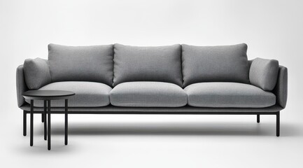 Contemporary three-seater sofa with patterned upholstery and accompanying side table