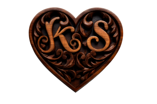 Heart shaped wooden carving with initials K and S in ornate design