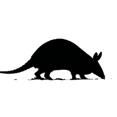 Solid black silhouette of an armadillo digging