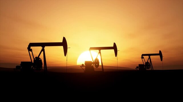 Pumpjacks Extract Oil Against a Sunset in a Peaceful Landscape