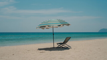 Beach Umbrella and Chair on Empty Tropical Shore