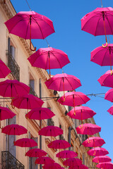 Obraz premium Pink umbrellas for breast cancer in Montpellier France