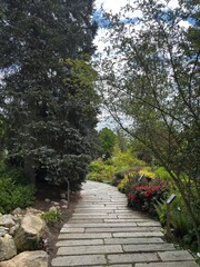 wide stone path through the garden