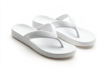 A white flip-flop, crafted from rubber, is depicted in isolation on a spotless white background, epitomizing a common type of summer footwear