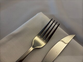 fork and knife utensils for eating in a restaurant
