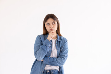 Closeup photo of amazing lady looking up empty space deep thinking creative person arm on chin wear...