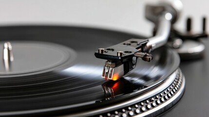 Vinyl record player spinning with focus on the stylus and the grooves for a vintage music experience