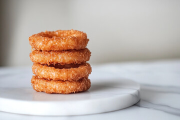 A towering stack of golden fried fries.