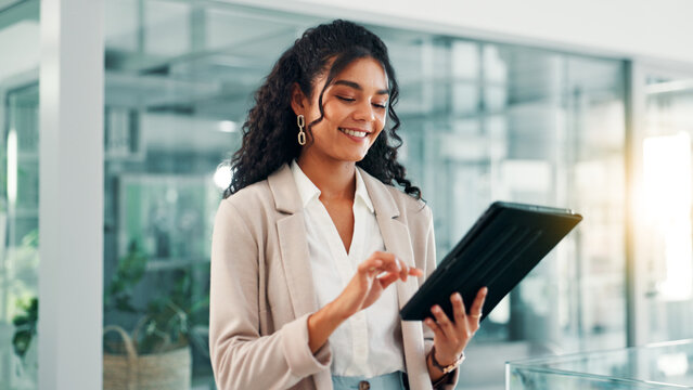 App, smile and tablet with business woman in office for information, project management, report. Internet, lens flare and review with happy employee in professional workplace for company development