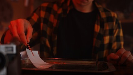 Developing Film in Classic Photography Darkroom Technique