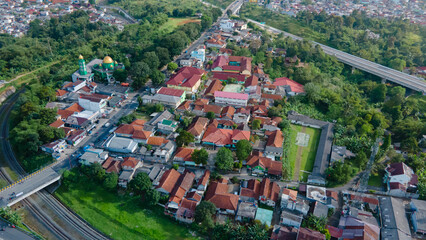 Drone Shot of Rural Town with Railway Line and Overpass Bridge
