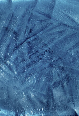 Ice texture with small round air bubbles trapped inside 