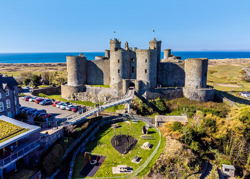 An aerial view towards Harlech castle and surrounding grounds, Harlech, Wales in springtime