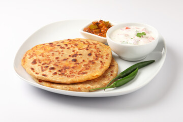 Aloo paratha, Famous Indian dish served with raita and pickle 
