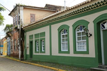 Cananeia city, south Sao Paulo state, old colonial protuguese style buildings from foundation historical center. Preserved and vibrant colors painted.