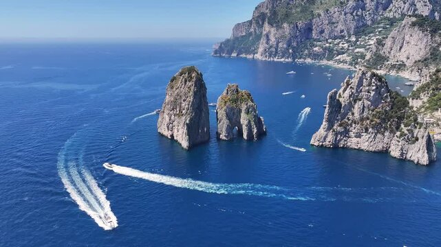 Faraglioni Of Capri At Naples In Campania Italy. Coastal Landscape. Waterfront Scene. Faraglioni Of Capri At Naples In Campania Italy. Beach Scenery. Paradisiac Seafront. Capri Island Skyline.