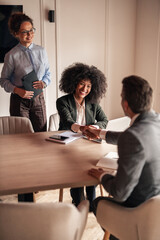 Professional Team Successfully Conducting a Business Meeting and Partnership Agreement