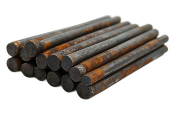 Pile of rusty iron rods of various lengths and thicknesses isolated on transparent background.