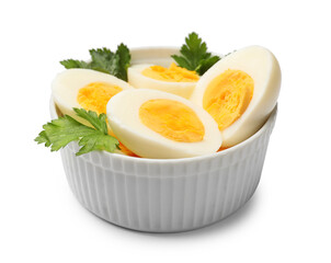 Boiled eggs and parsley in bowl on white background