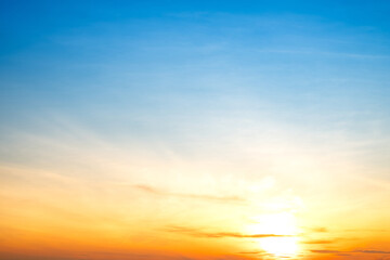 Sky,sunset, beautiful , luxury soft gradient orange gold clouds and sunlight on the blue sky perfect for the background, Sunrise on morning or everning in winter warm time ,Twilight summer,silhouette